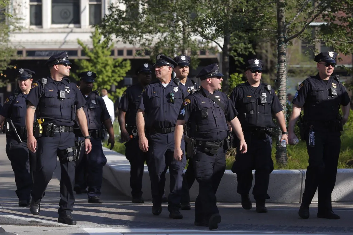 Police officers patrol around the Cleveland Public Square in preparation for the Republican National Convention on July 15, 2016, in Cleveland, Ohio. (DOMINICK REUTER/AFP/Getty Images)