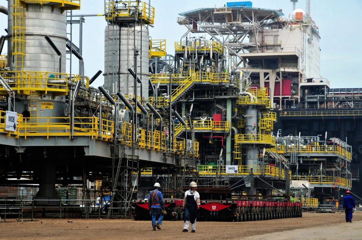 People work at an offshore oil engineering platform in Qingdao, east China's Shandong Province in this file photo. (STR/AFP/Getty Images)
