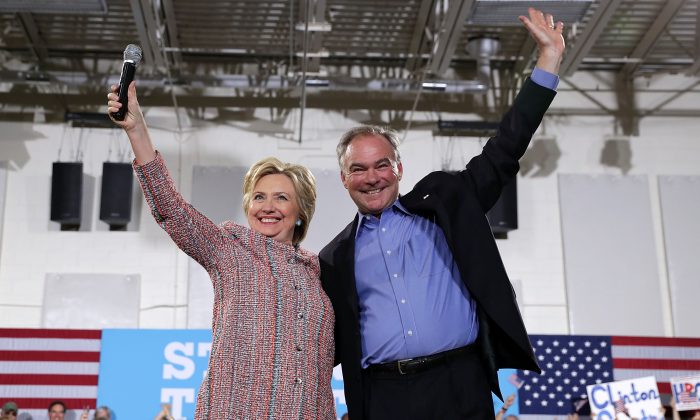 Democratic presidential candidate Hillary Clinton (L) and U.S. Sen. Tim Kaine (D-VA) during a campaign event at Ernst Community Cultural Center at Northern Virginia Community College July 14, 2016 in Annandale, Virginia. Hillary Clinton continued to campaign for the general election in November.  (Alex Wong/Getty Images)