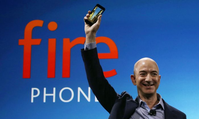 Amazon CEO Jeff Bezos introduces the new Amazon Fire Phone in Seattle on June 18, 2014. (AP Photo/Ted S. Warren, File)