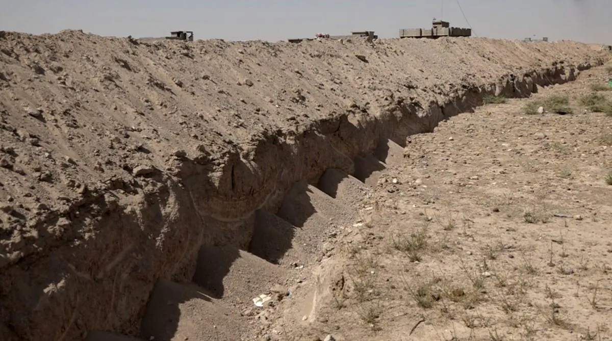 A freshly-dug trench on the outskirts of Fallujah, Iraq, on July 22, 2016. (AP photo via AP video)