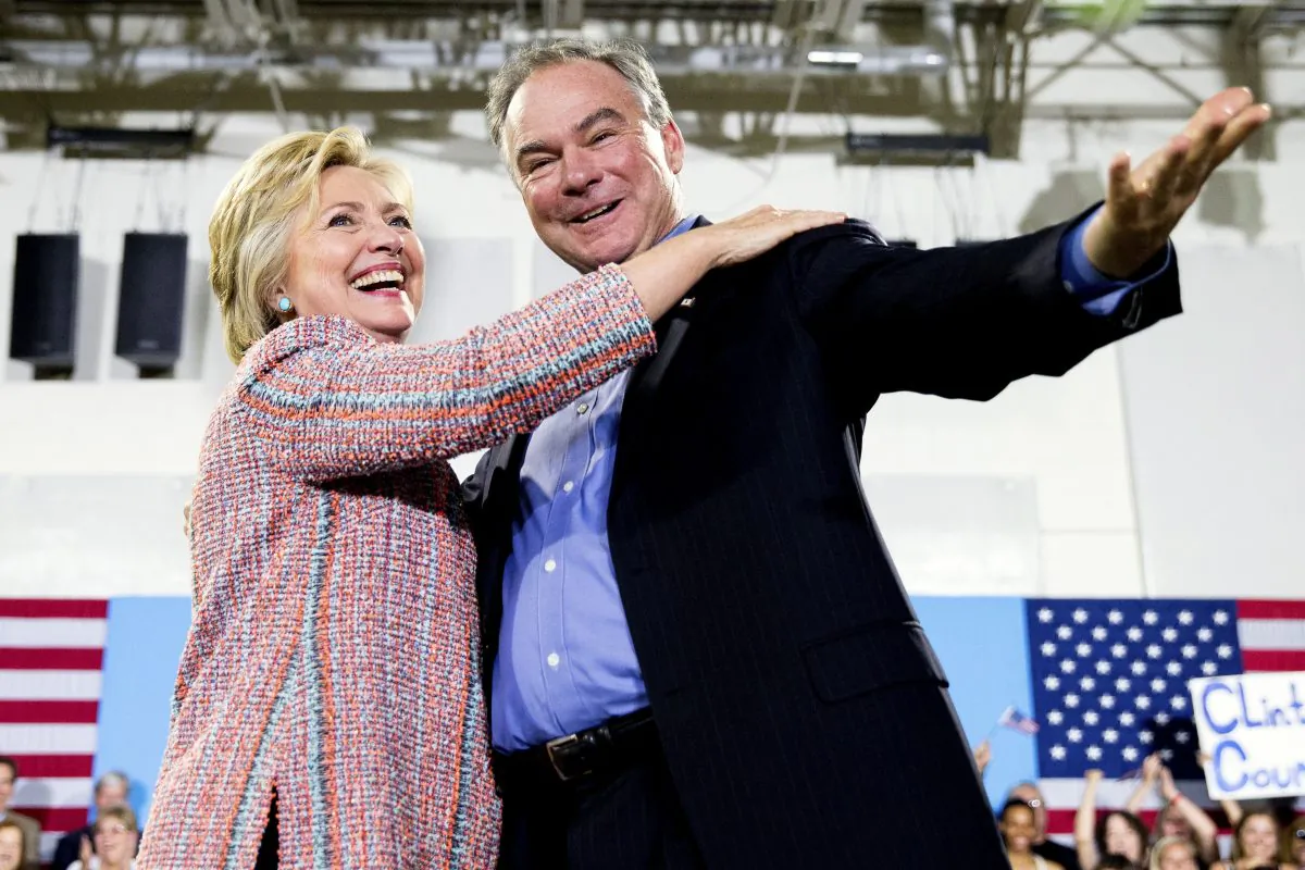 Democratic presidential candidate Hillary Clinton, accompanied by Sen. Tim Kaine (D-Va.), speaks at a rally at Northern Virginia Community College in Annandale, Va., on July 14, 2016. Clinton has chosen Kaine to be her running mate. (AP Photo/Andrew Harnik)