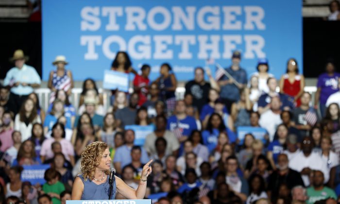 DNC chairwoman, Rep. Debbie Wasserman Schultz speaks during a campaign event for Democratic presidential candidate Hillary Clinton at the Florida State Fairgrounds Entertainment Hall, Friday, July 22, 2016, in Tampa, Fla. (AP Photo/Mary Altaffer)