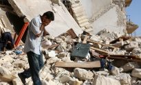 Syrian Civilians Begin Leaving Rebel-Held Parts of Aleppo