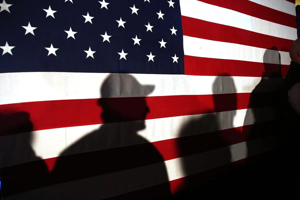 Shadows are reflected on an American Flag in Myrtle Beach, S.C., on Feb. 11, 2016. (Spencer Platt/Getty Images)
