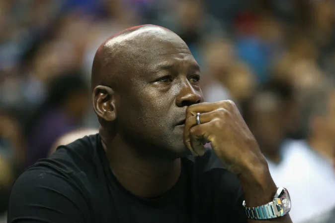 Owner of the Charlotte Hornets, Michael Jordan, watches on during their game against the Atlanta Hawks at Time Warner Cable Arena on November 1, 2015 in Charlotte, North Carolina. (Streeter Lecka/Getty Images)