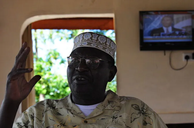 President Barack Obama's Kenyan half brother, Malik Obama speaks at an interview January 16, 2013 at the peaceful hamlet of Nyang'oma in Kogelo renowned as the Obama's traditional home. Malik has launched his own political career by announcing his intention to run for a Kenyan gubernatorial seat in the upcoming March 4 general elections. Malik, 54, who shares a father with the US president told AFP that the achievements of his more famous half brother have 'inspired and challenged' him to get into active politics in his homeland. The trained economist said he is the right candidate to deal with the 'endless cycle of poverty and unemployment that bedevils my people.' . AFP PHOTO/Tony KARUMBA (Photo credit should read TONY KARUMBA/AFP/Getty Images)
