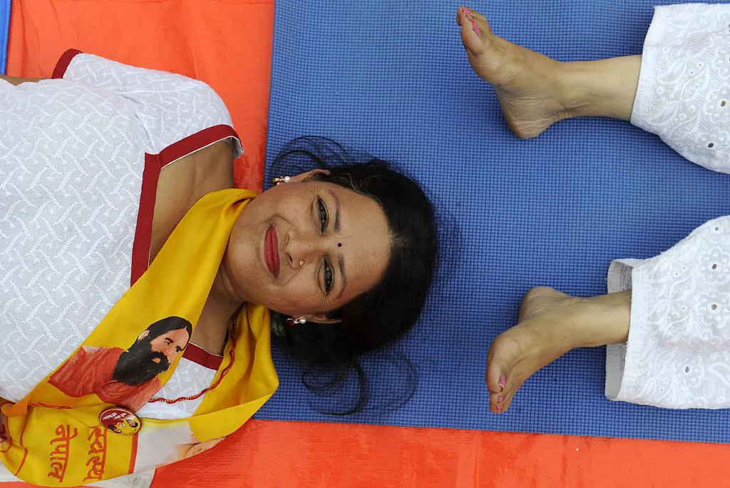 A Nepali yoga practioneer takes part in a yoga session to mark International Yoga Day in Kathmandu on June 21, 2016.  (Prakash Mathema/AFP/Getty Images)