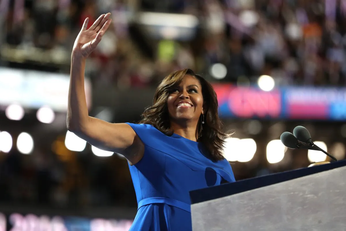 First lady Michelle Obama acknowledges the crowd after delivering remarks on the first day of the Democratic National Convention at the Wells Fargo Center, July 25, 2016 in Philadelphia, Pennsylvania.  (Photo by Joe Raedle/Getty Images)