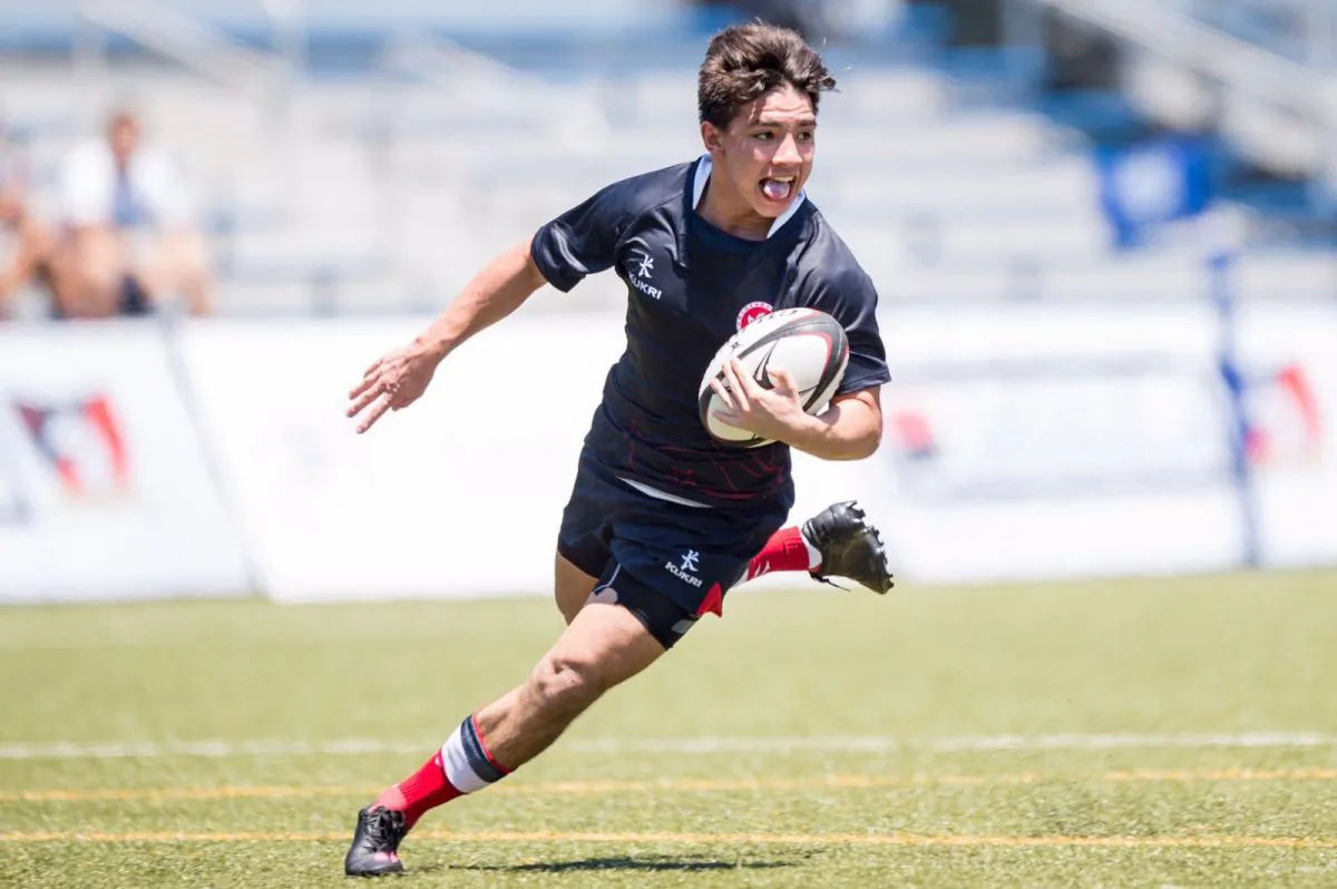 Mark Coebergh scores for Hong Kong Schools Sports Federation 7s team during the Pool matches at King’s Park on Saturday July 23, 2016 (ARFU)
