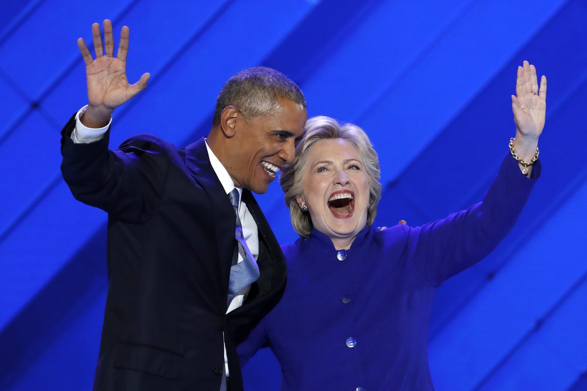 President Barack Obama and Democratic presidential nominee Hillary Clinton wave to delegates after Obama’s speech during the third day of the Democratic National Convention in Philadelphia, on July 27, 2016. (J. Scott Applewhite/AP Photo)