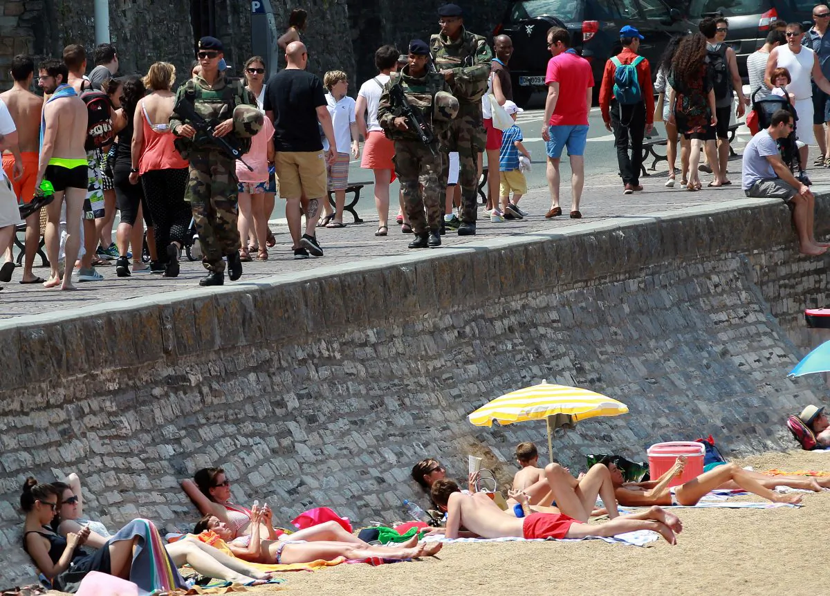 French soldiers patrols near the Biarritz's beach, southwestern France, on July 30, 2016. (AP Photo/Bob Edme)