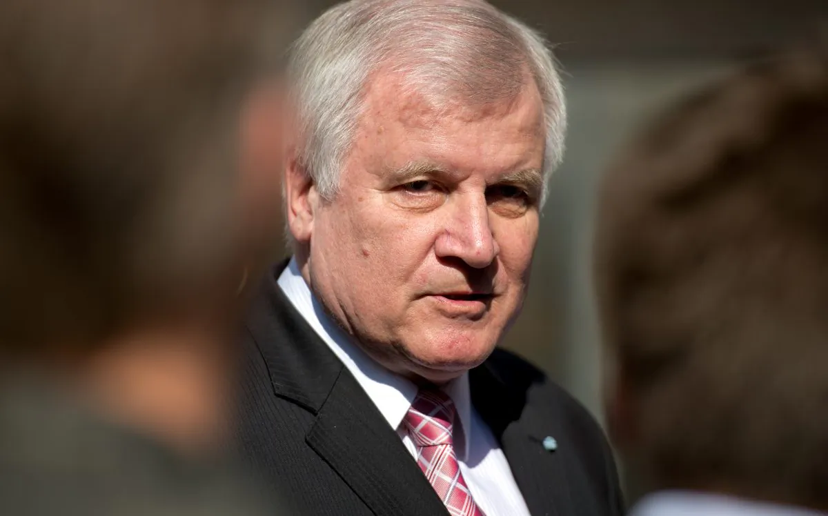 Bavarian governor Horst Seehofer arrives for a meeting of his Christian Social Union party in Munich, Germany, on May 18, 2015. (Sven Hoppe/dpa via AP)