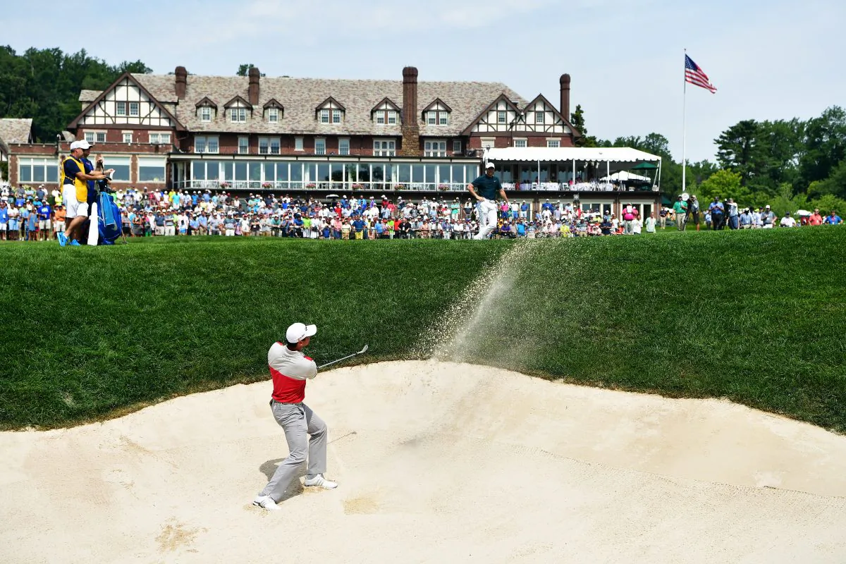 Jason Day plays a shot from a bunker on the 18th hole during the first round of the 2016 PGA Championship at Baltusrol Golf Club. (Stuart Franklin/Getty Images) 