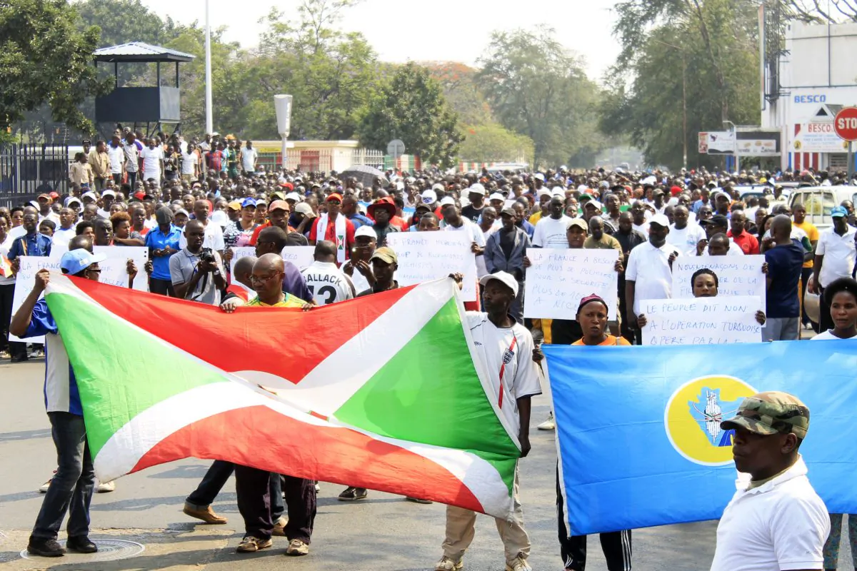 Around 1,000 people march in Bujumbura on July 30, 2016, in protest against a United Nations Security Council decision to send a police contingent to the violence-wracked country. (STR/AFP/Getty Images)