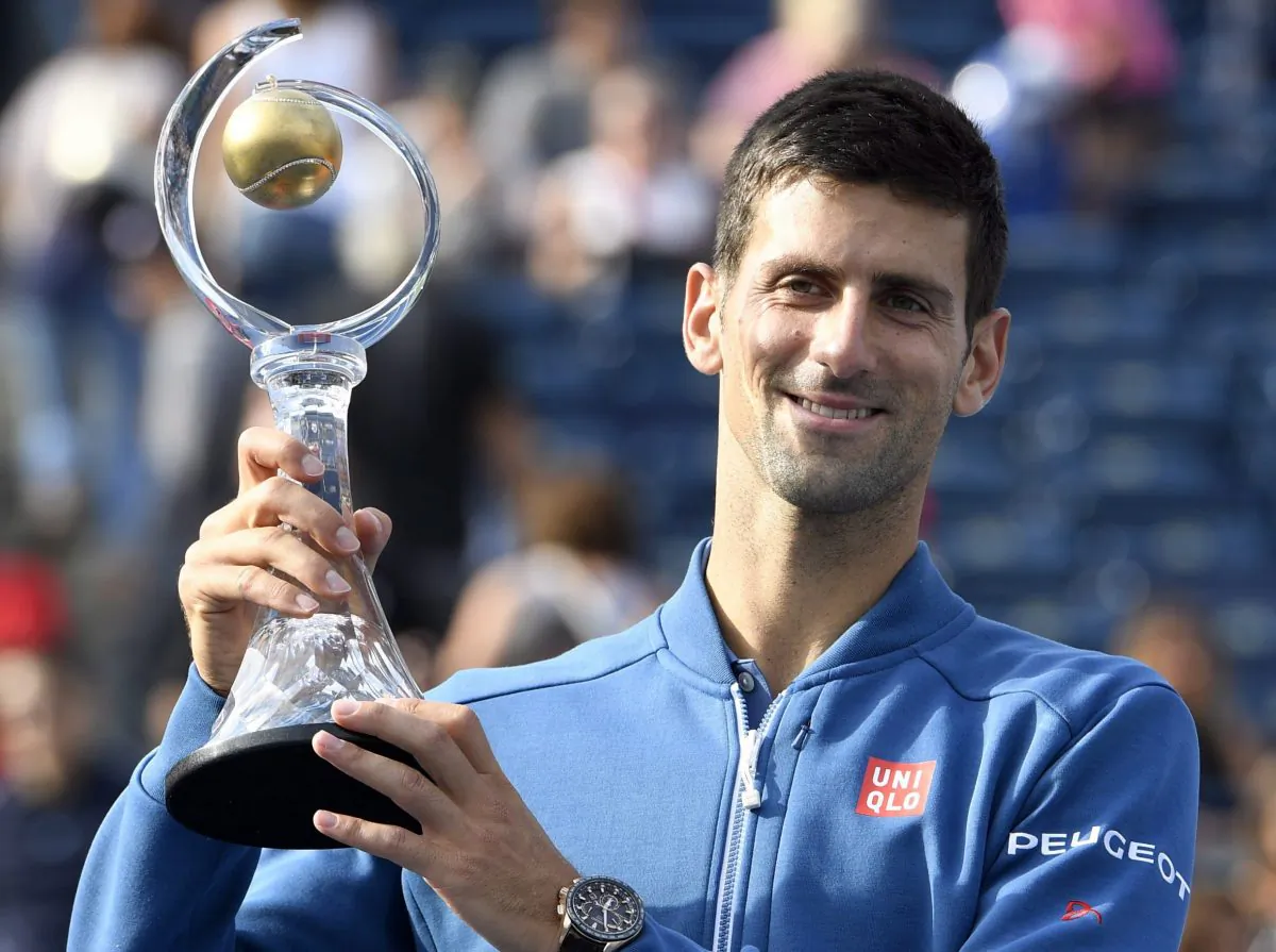Novak Djokovic celebrates his win over Kei Nishikori at the Rogers Cup in Toronto on July 31, 2016. Both players will head to Brazil for the Rio Olympics next. (The Canadian Press/Frank Gunn)