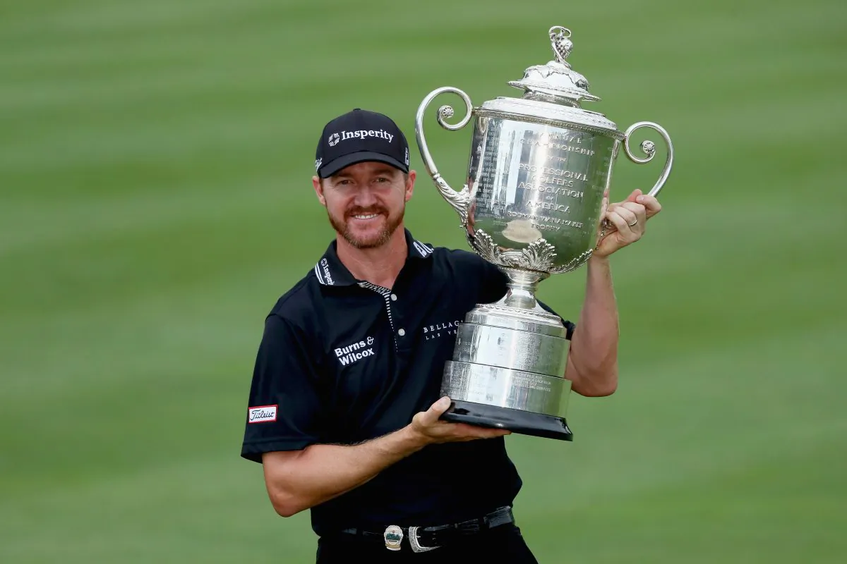 Jimmy Walker celebrates with the Wanamaker Trophy after winning the 2016 PGA Championship at Baltusrol Golf Club on July 31. (Andrew Redington/Getty Images)