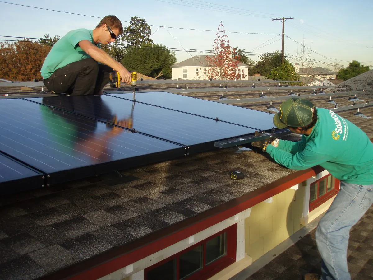 Workers from Solarcity install solar panels on a home in California in this file photo. (Steve & Michelle Gerdes/Flickr/CC BY-NC-ND)