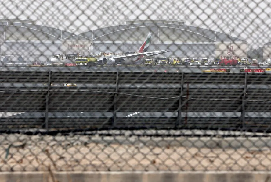 A damaged Boeing 777 is seen at the Dubai airport after it crash-landed, in Dubai, United Arab Emirates, Wednesday, Aug 3, 2016. Dubai-based airline Emirates has confirmed that there were no fatalities on the flight from India that crash-landed at Dubai’s main airport Wednesday. The carrier says “all passengers and crew are accounted for and safe.” The airline said there were 282 passengers, 18 crew on board. (AP Photo/Jon Gambrell)