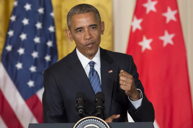 US President Barack Obama speaks about Republican presidential nominee Donald Trump during a press conference with Singapore's Prime Minister Lee Hsien Loong as part of a State Visit in the East Room of the White House in Washington, DC, August 2, 2016. / AFP / SAUL LOEB (SAUL LOEB/AFP/Getty Images)
