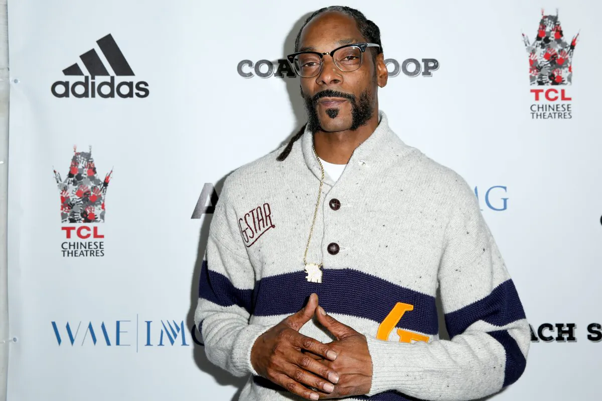 Snoop Dogg arrives at the LA Premiere of "Coach Snoop" at the TCL Chinese 6 Theatres in Los Angeles on May 16, 2016. (Rich Fury/Invision/AP)