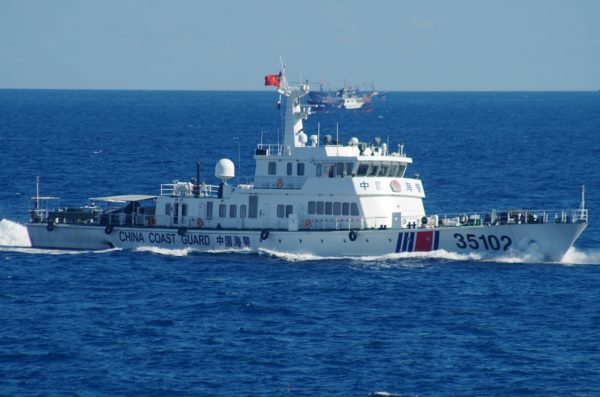 A Chinese coast guard vessel sails near disputed East China Sea islands on Aug. 6, 2016. Japan's Foreign Ministry said in a statement it filed the protest after Japan's coast guard spotted the vessels Saturday along with a fleet of 230 Chinese fishing boats swarming around the Japanese-controlled Senkaku Islands. China also claims the islands, calling them the Diaoyu. (11th Regional Coast Guard Headquarters via AP)