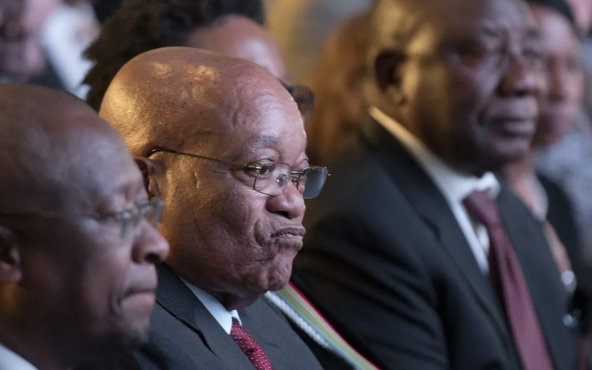 President Jacob Zuma (C) and Deputy President Cyril Ramaphosa (R) attend the declaration announcement of the municipal elections in Pretoria, South Africa, on Aug. 6, 2016. This is the worst-ever election showing for South Africa's ruling party, The African National Congress (ANC), after corruption scandals and a stagnant economy that has frustrated the urban middle class. (AP Photo/Herman Verwey)