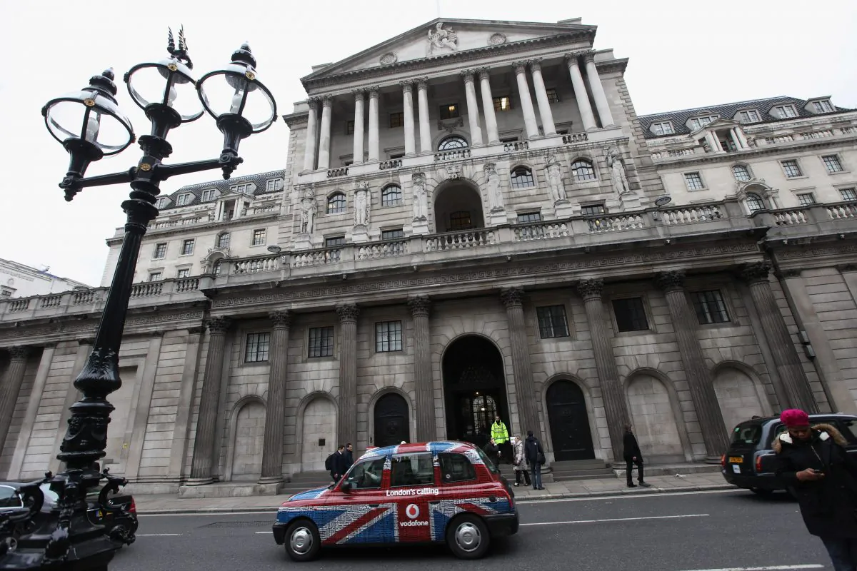 A taxi drives past the front of the Bank of England in London's financial district on Jan. 25, 2012. (Oli Scarff/Getty Images)