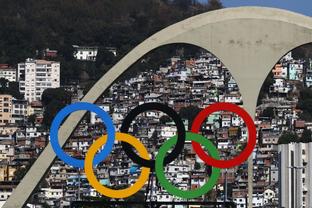The Olympic Rings are seen with favelas in the background during the Men's Team Quarter Finals on Day 1 of the Rio 2016 Olympic Games at the Sambodromo in Rio de Janeiro, Brazil, on Aug. 6, 2016. (Paul Gilham/Getty Images)