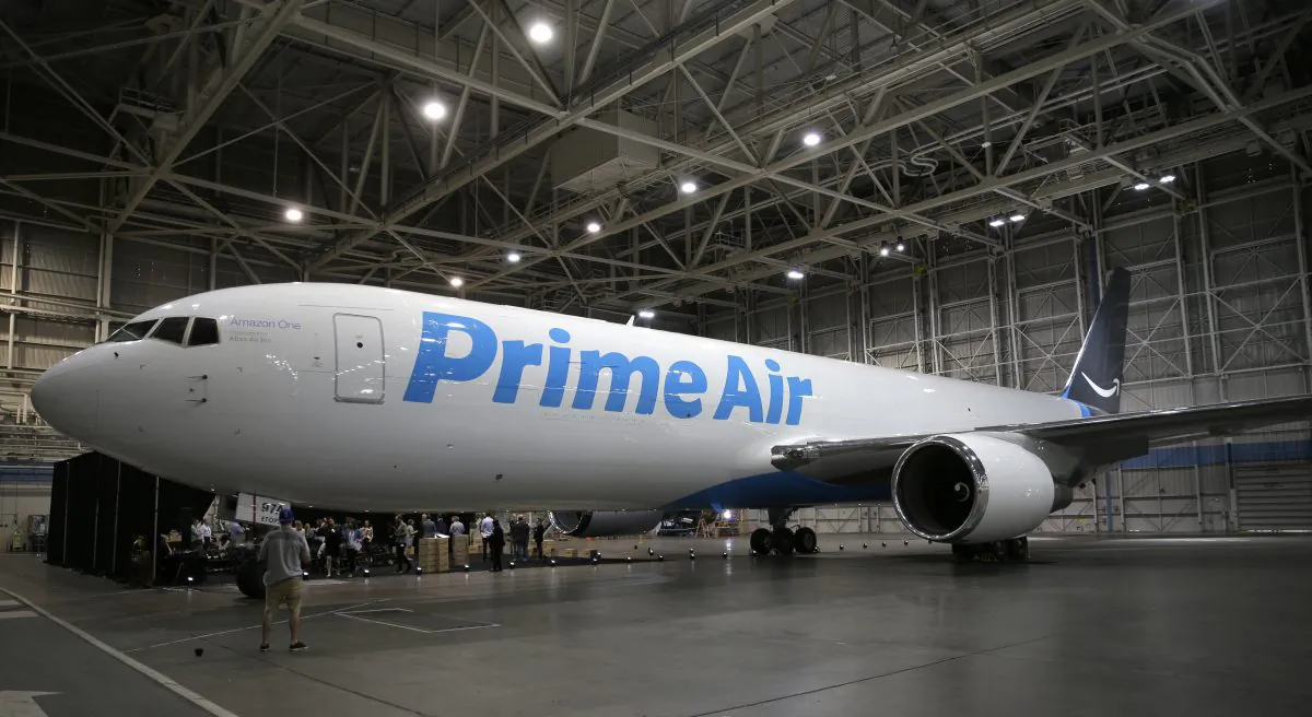 A Boeing 767, an Amazon.com "Prime Air" cargo plane is parked on display in a Boeing hangar in Seattle, on Aug. 4. (Ted S. Warren/AP Photo)