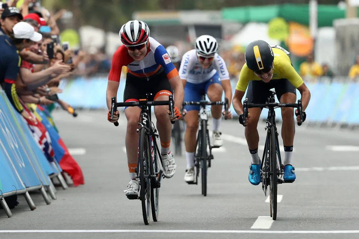 Anna van der Breggen of the Netherlands (L) outsprints Emma Johansson (R) and Elisa Longo-Borghini of Italy (C)  to win gold in the Women's Road Race on Day 2 of the Rio 2016 Olympic Games at Fort Copacabana  in Rio de Janeiro, Brazil, on Aug. 7, 2016. (Patrick Smith/Getty Images)