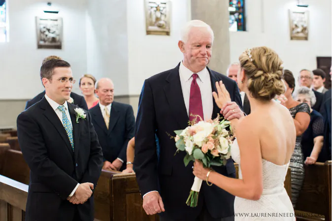 Jeni Stepien with Arthur Thomas after he walked her down the aisle at her wedding on Aug. 6. Here she feels her father, Michael's heartbeat. (Lauren Renee/http://clients.laurenreneedesigns.com/jenipaul/)
