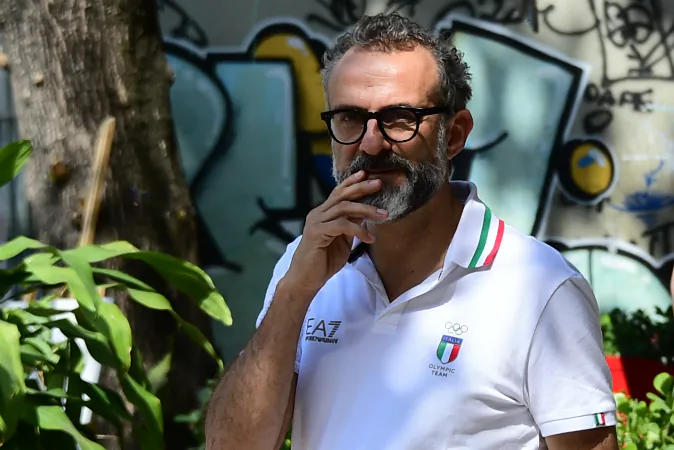 Italian chef Massimo Bottura and Brazilian chef David Hertz (not pictured) use surplus food donated by the catering companies at the Olympic park and athletes' village to feed Rio's hungry population. (TASSO MARCELO/AFP/Getty Images) 