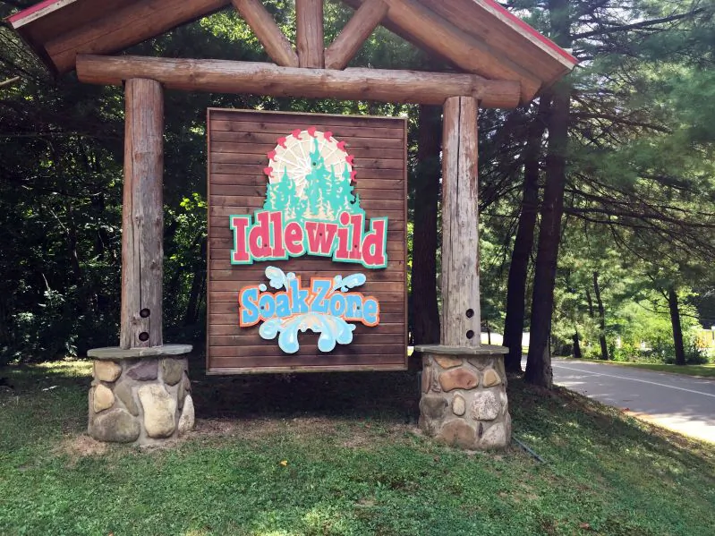 The entrance to Idlewild and SoakZone amusement park, in Lingonier, Pa., where a boy fell from a wooden roller coaster and is hospitalized. A spokesman for Idlewild and SoakZone amusement park says the boy was on the ride with his brother Thursday, Aug. 11, 2016, when he fell. His age wasn't released. A Westmoreland County emergency dispatcher says the boy was conscious and airlifted to a hospital. (Darrell Sapp/Pittsburgh Post-Gazette via AP)