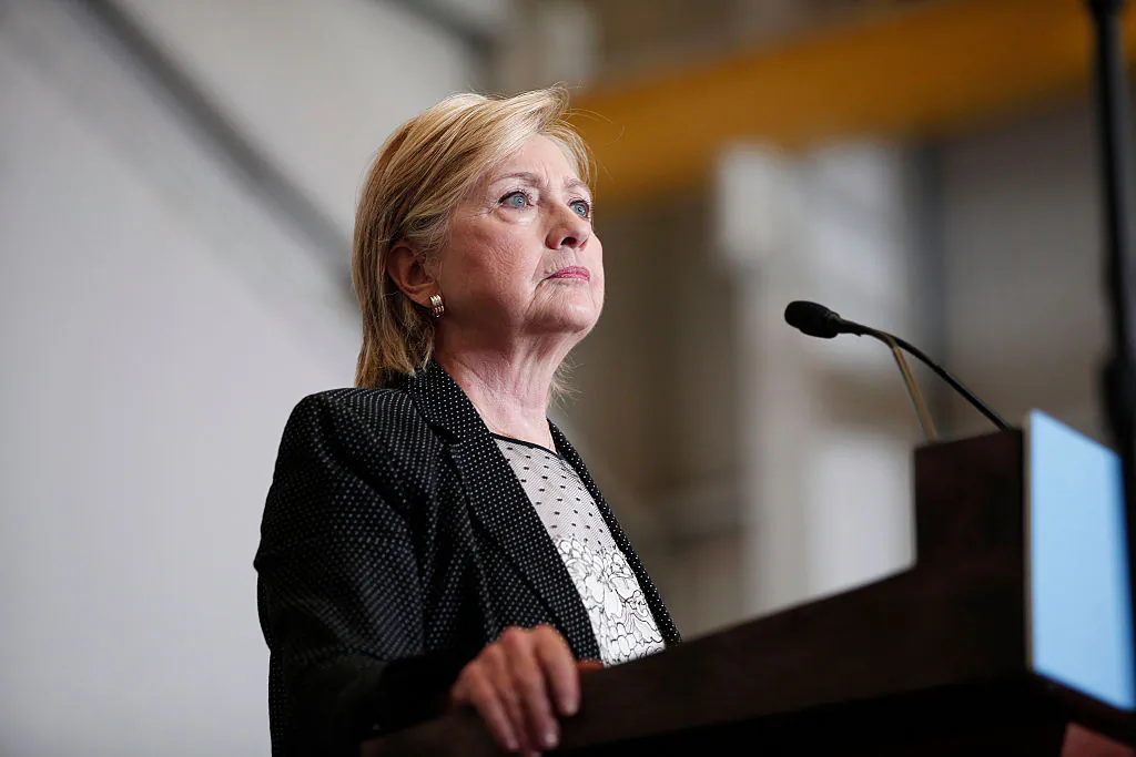 WARREN, MI - AUGUST 11: Democratic presidential nominee Hillary Clinton delivers a speech on the U.S economy at Futuramic Tool & Engineering August 11, 2016 in Warren, Michigan. In her speech, Clinton contrasted her economic plan to that of Republican presidential nominee Donald Trump's. (Photo by Bill Pugliano/Getty Images)
