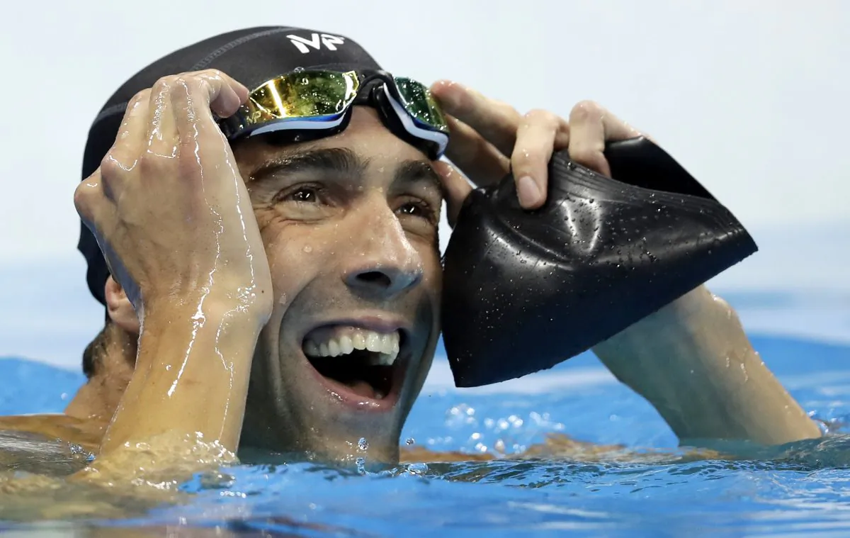 United States' Michael Phelps reacts after the men's 100 Meter Butterfly Final during the swimming competitions at the 2016 Summer Olympics in Rio de Janeiro, Brazil, on Aug. 12, 2016. (AP Photo/Michael Sohn)