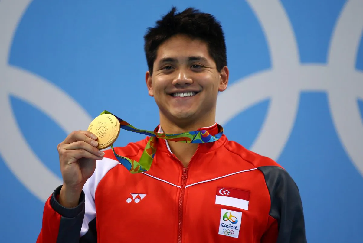Joseph Schooling of Singapore celebrates winning the gold medal in the Men's 100m Butterfly Final on Day 7 of the Rio 2016 Olympic Games at the Olympic Aquatics Stadium in Rio de Janeiro, Brazil, on Aug. 12, 2016. (Clive Rose/Getty Images)
