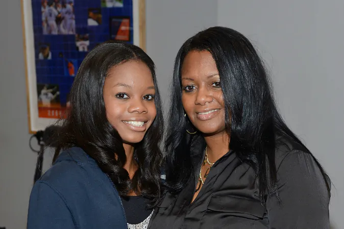 Gold medalist Gabby Douglas (L) and mother Natalie Hawkins pose for a picture at Citi Field on August 23, 2012 in New York City. (Photo by Mike Coppola/Getty Images)