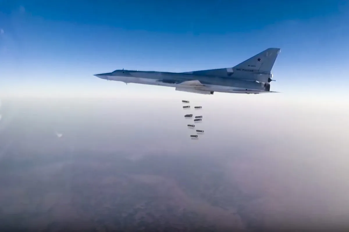 In this frame grab from video provided by the Russian Defence Ministry Press Service, Russian long range bomber Tu-22M3 flies during a strike above an undisclosed location in Syria on Aug. 14, 2015. (Russian Defence Ministry press service photo via AP)
