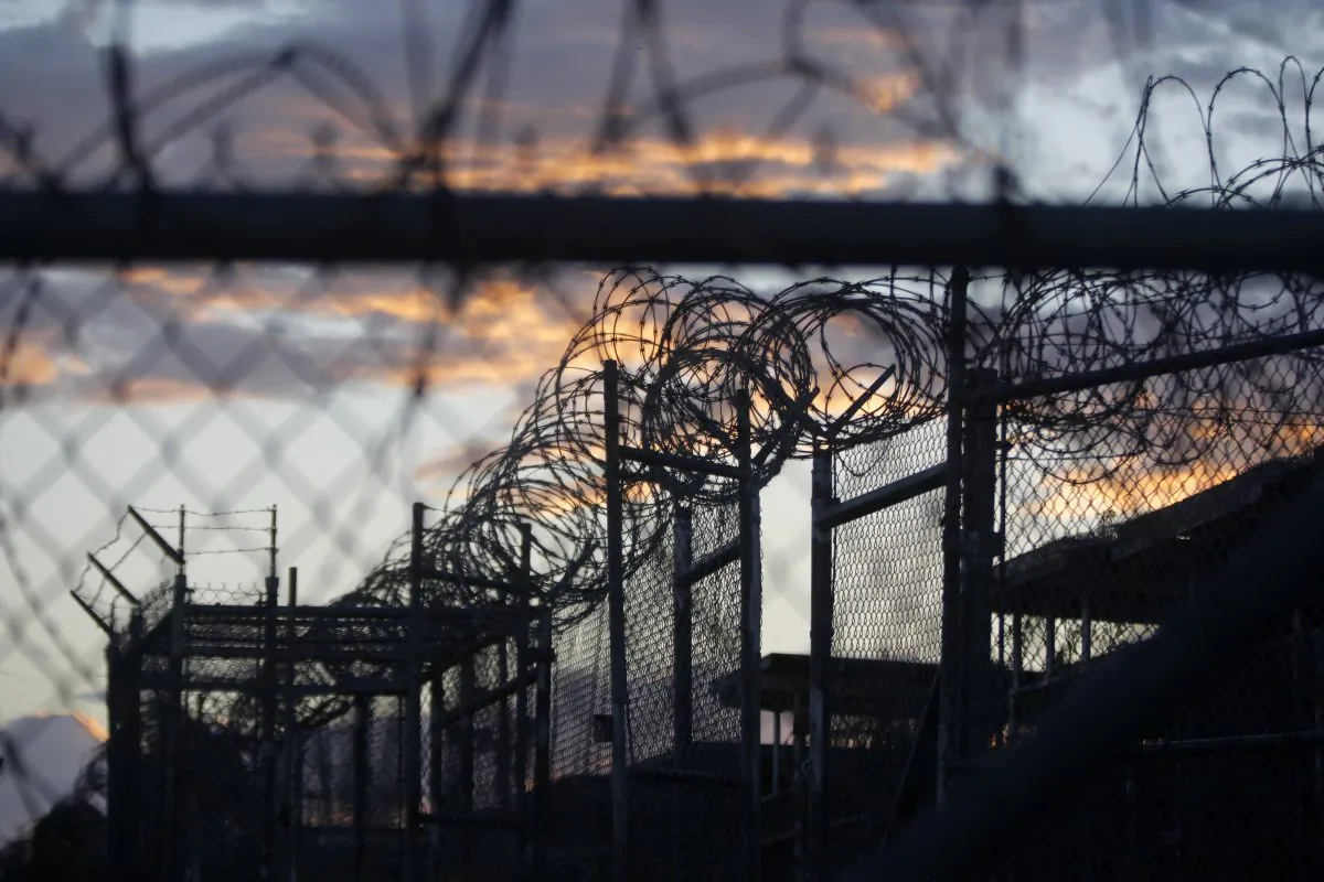 Dawn arrives at the now closed Camp X-Ray, which was used as the first detention facility for al-Qaida and Taliban militants who were captured after the Sept. 11 attacks, at the Guantanamo Bay Naval Base, Cuba, on Nov. 21, 2013. (Charles Dharapak/AP File Photo)