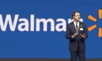 Wal-Mart Raises Annual Profit; Tops Street 2Q Forecasts