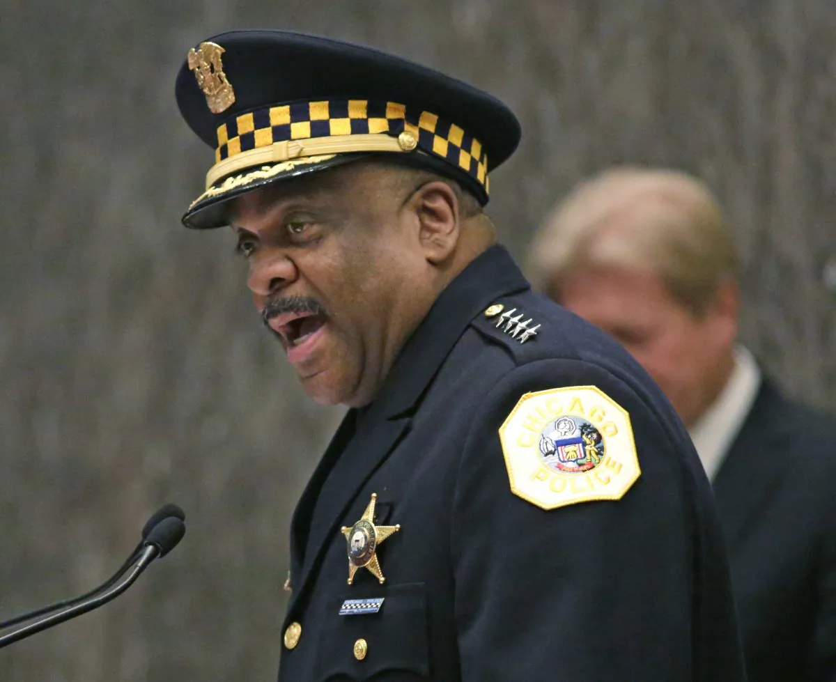 Eddie Johnson, left, speaks after being sworn in as the new Chicago police superintendent in Chicago, on April 13, 2016. (M. Spencer Green, AP Photo/File)