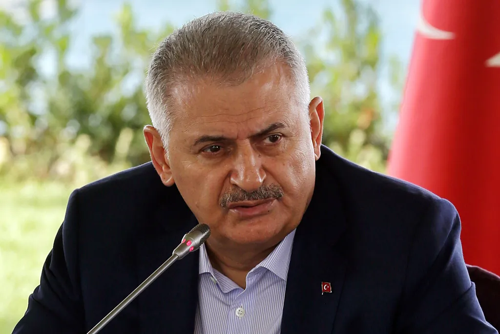 Turkish Prime Minister Binali Yildirim speaks during a meeting with foreign media representatives in Istanbul on Aug. 20, 2016. (Prime Minister Press Service via AP)