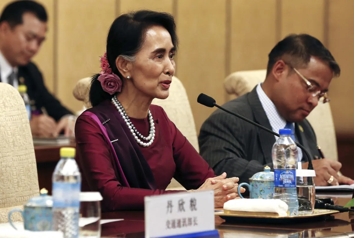 Burma's State Counselor Aung San Suu Kyi hold a talk with Chinese President Xi Jinping, at the Diaoyutai State Guesthouse in Beijing, China, on Aug. 19, 2016. (Rolex Dela Pena/Pool Photo via AP)