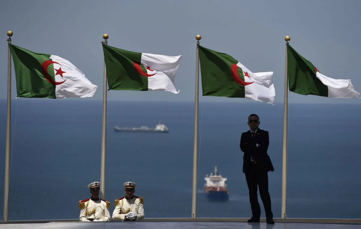 Members of the Algerian Republican Guards and a security offical stand guard at Martyr's Shrine in the Algerian capital, Algiers, on June 15, 2015. (Farouk Batiche/AFP/Getty Images)