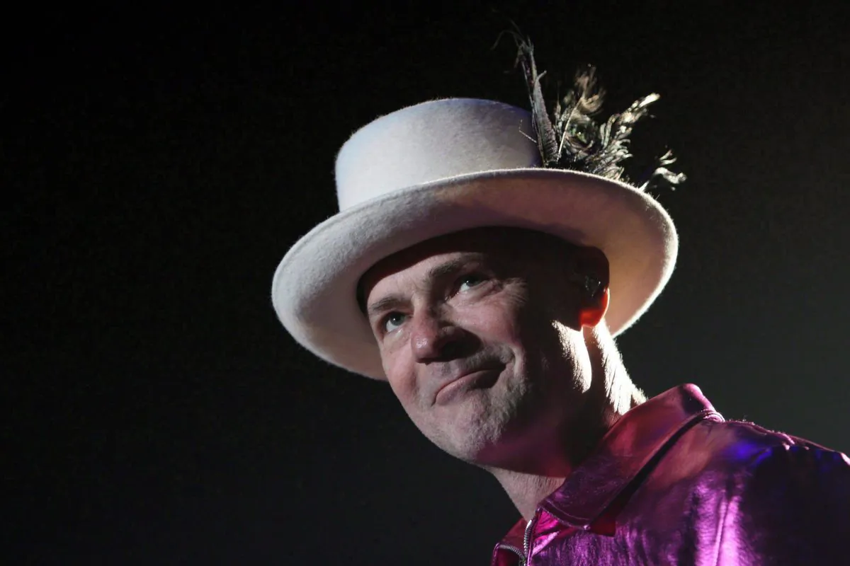 The Tragically Hip's Gord Downie performs during the first stop of the Man Machine Poem Tour at the Save-On-Foods Memorial Centre in Victoria, B.C., July 22, 2016. (THE CANADIAN PRESS/Chad Hipolito)