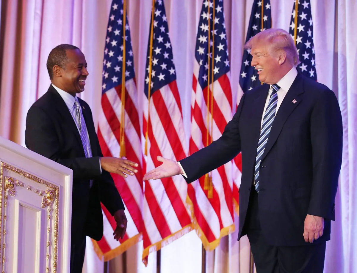Then Republican presidential candidate Donald Trump with former presidential candidate Ben Carson as he receives his endorsement at the Mar-A-Lago Club on March 11, 2016 in Palm Beach, Florida. (Joe Raedle/Getty Images)