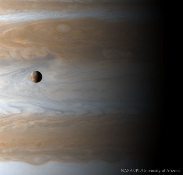 How big is Jupiter's moon Io? The most volcanic body in the Solar System, Io (usually pronounced "EYE-oh") is 3,600 kilometers in diameter, about the size of Earthâs moon. Gliding past Jupiter at the turn of the millennium, the Cassini spacecraft captured this awe inspiring view of active Io with the largest gas giant as a backdrop, offering a stunning demonstration of the planet's relative size. (Cassini Imaging Team, SSI, JPL, ESA, NASA)