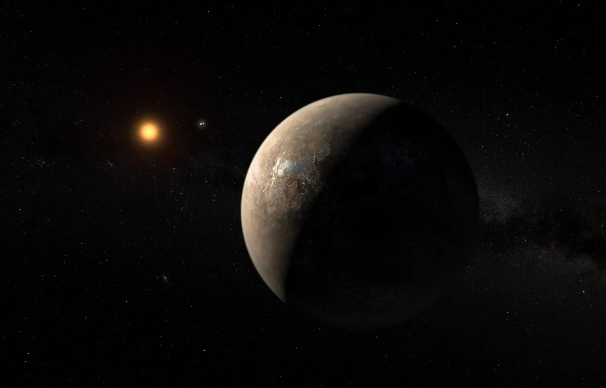 This artist’s impression shows the planet Proxima b orbiting the red dwarf star Proxima Centauri, the closest star to the Solar System. (ESO/M. Kornmesser)