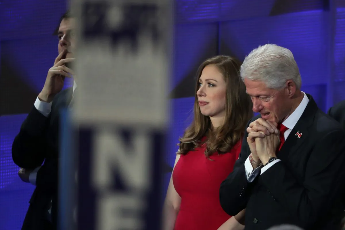 Chelsea Clinton and former US President Bill Clinton seen at the end of the fourth day of the Democratic National Convention at the Wells Fargo Center, July 28, 2016 in Philadelphia, Pennsylvania. (Alex Wong/Getty Images)
